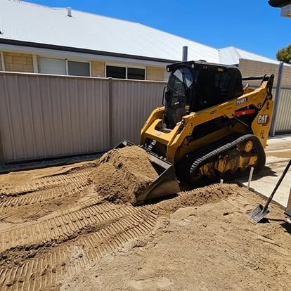 Digger preparing the ground for a new lawn - Australind - Western Australia - Fergies Total Lawn Care Digger preparing the ground for a new lawn - Australind - Western Australia - Fergies Total Lawn Care