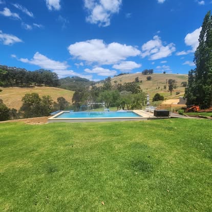 Lawn created by Fergies Total Lawn Care surrounding a pool in Eaton Western Australia Lawn created by Fergies Total Lawn Care surrounding a pool in Eaton Western Australia